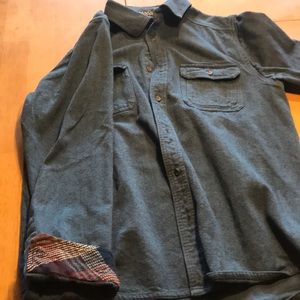 Kavu blue button up shirt.